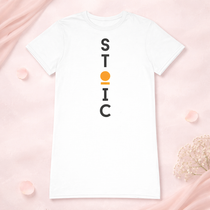 Front of a white t-shirt dress with vertical 'STOIC' logo on a pink background.
