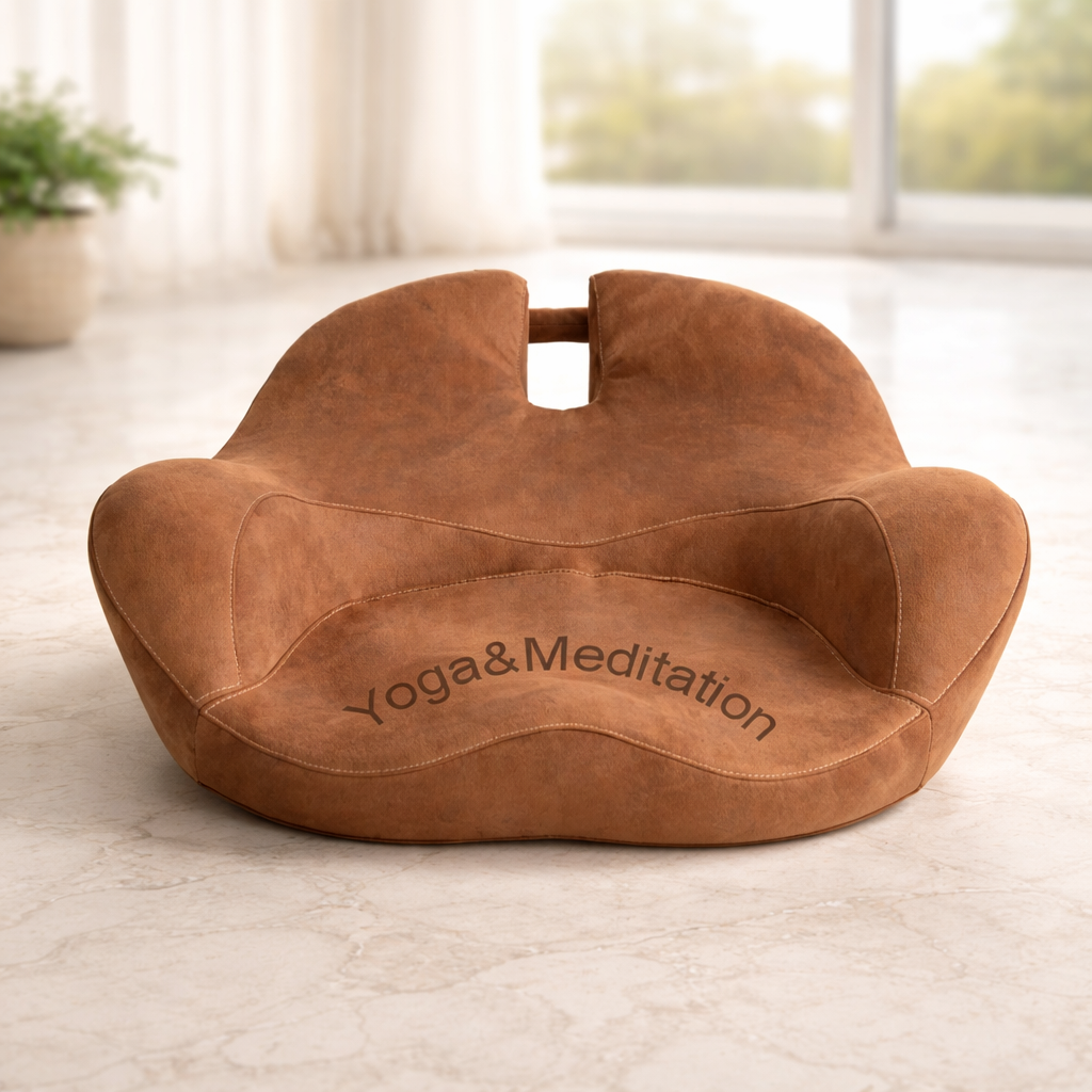Brown yoga and meditation pillow on a light wooden floor with a blurred window background