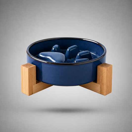 Blue ceramic bowl with wooden stand on a gray background